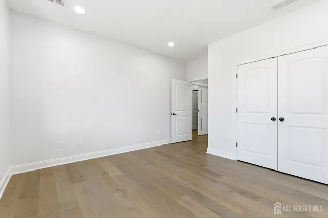 a view of an empty walk in closet