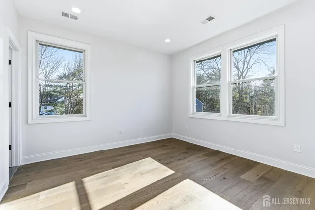 a bathroom with a shower and a toilet