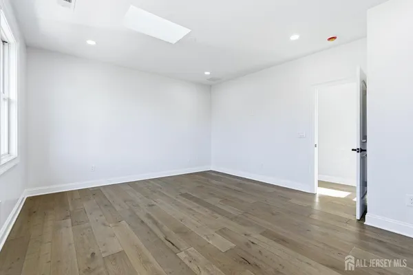 a view of backyard with large trees