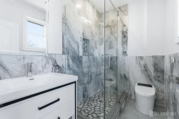 an aerial view of houses with outdoor space