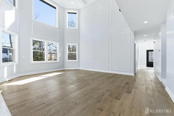a kitchen with stainless steel appliances a sink and cabinets