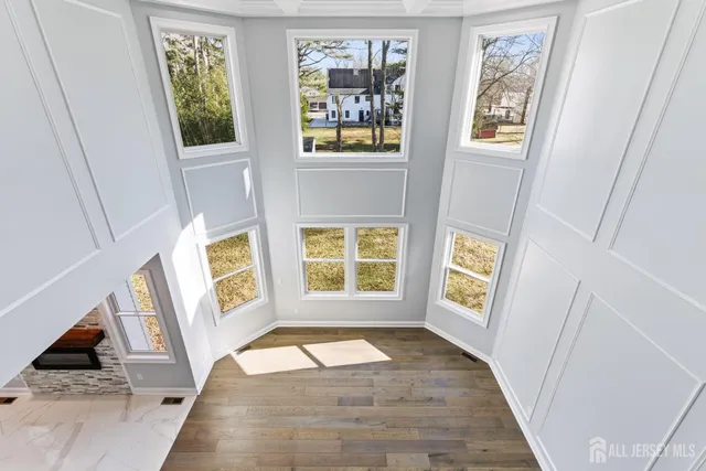 a kitchen with granite countertop a sink stove and cabinets