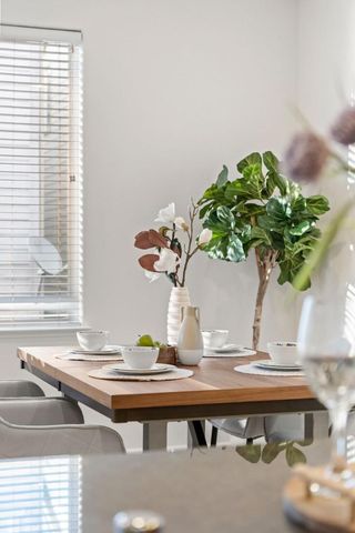 a vase of flowers sitting on a table