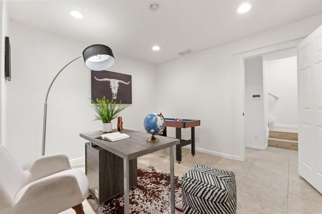 a view of a livingroom with furniture