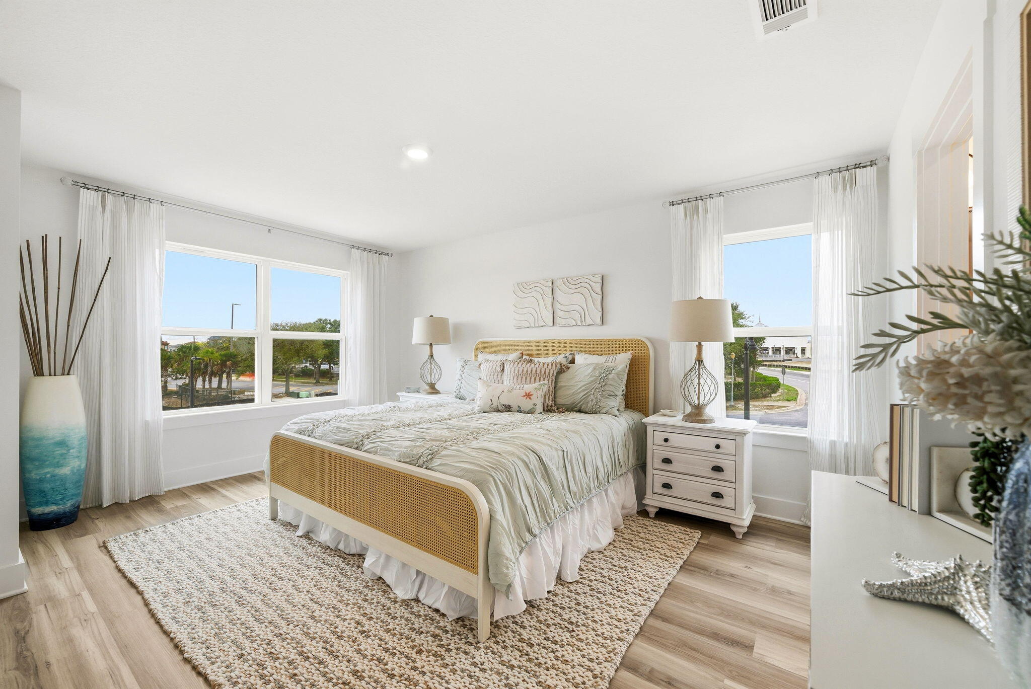 105 Foxtail Way, Unit 58 Destin, FL 32541 - Photo 13 of 21 a spacious bedroom with a large bed and a window