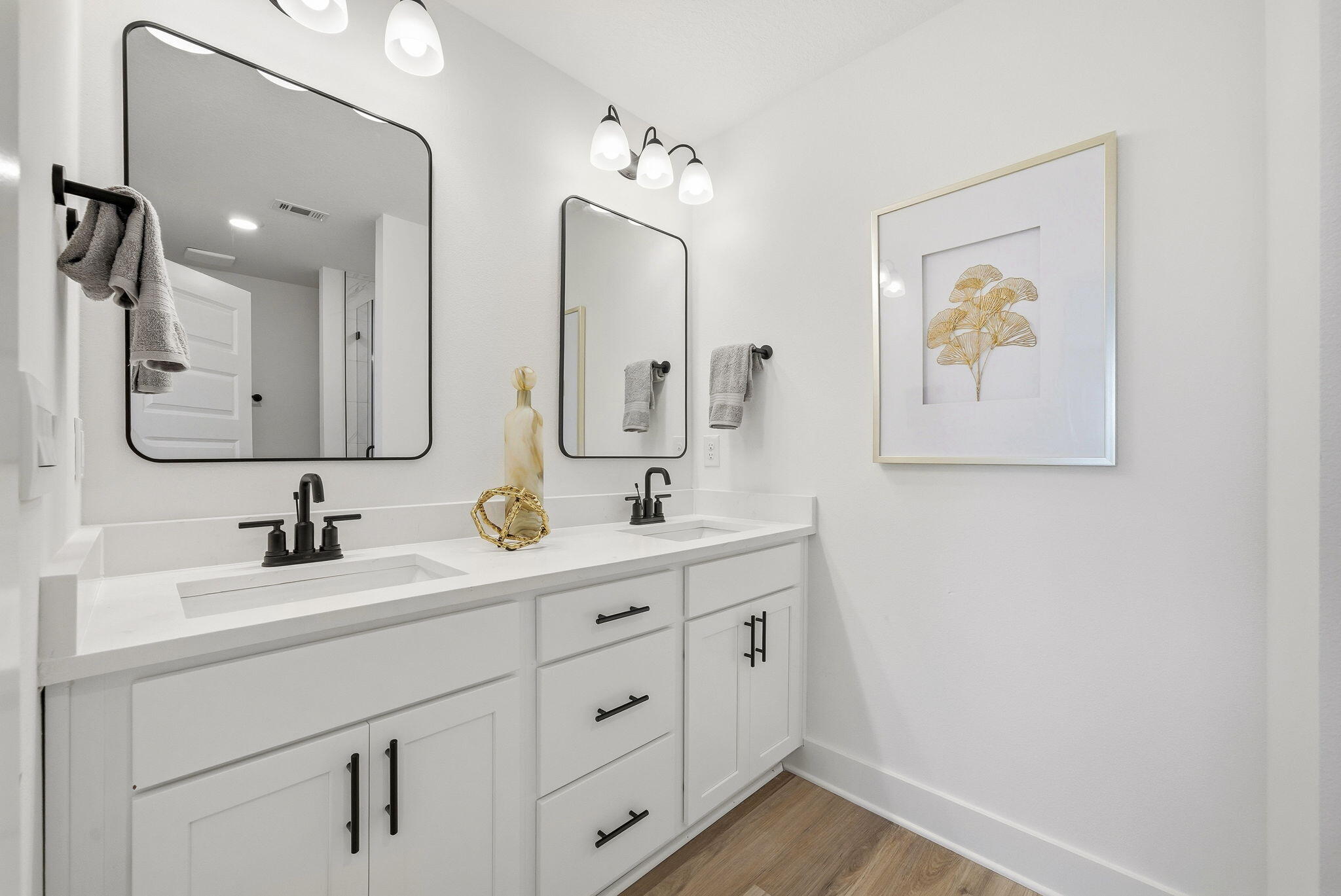 105 Foxtail Way, Unit 58 Destin, FL 32541 - Photo 18 of 21 a bathroom with a double vanity sink and a mirror