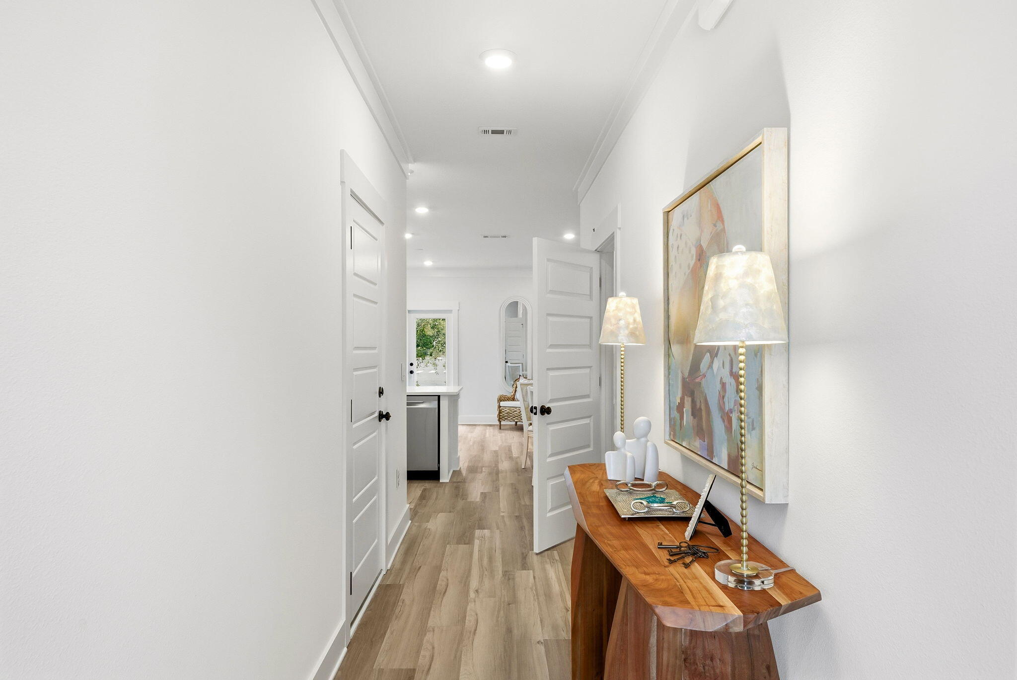 105 Foxtail Way, Unit 58 Destin, FL 32541 - Photo 3 of 21 view of hall way with furniture and wooden floor
