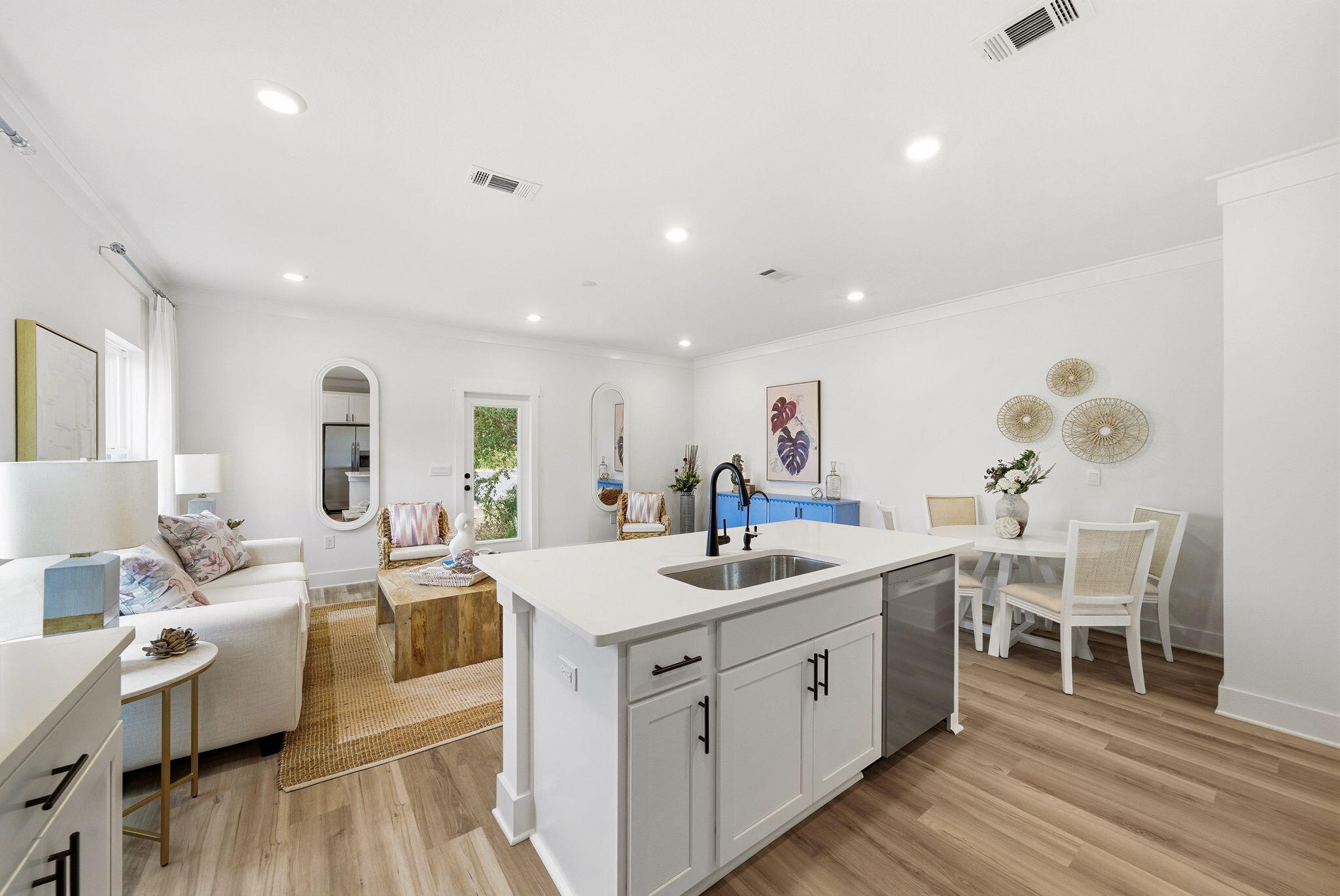 105 Foxtail Way, Unit 58 Destin, FL 32541 - Photo 9 of 21 a kitchen with a sink and wooden floor