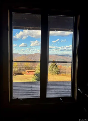 a balcony with an ocean view