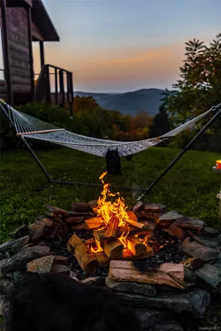 a view of a glass door and a yard