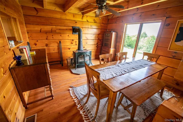 a view of bathroom with a sink and mirror