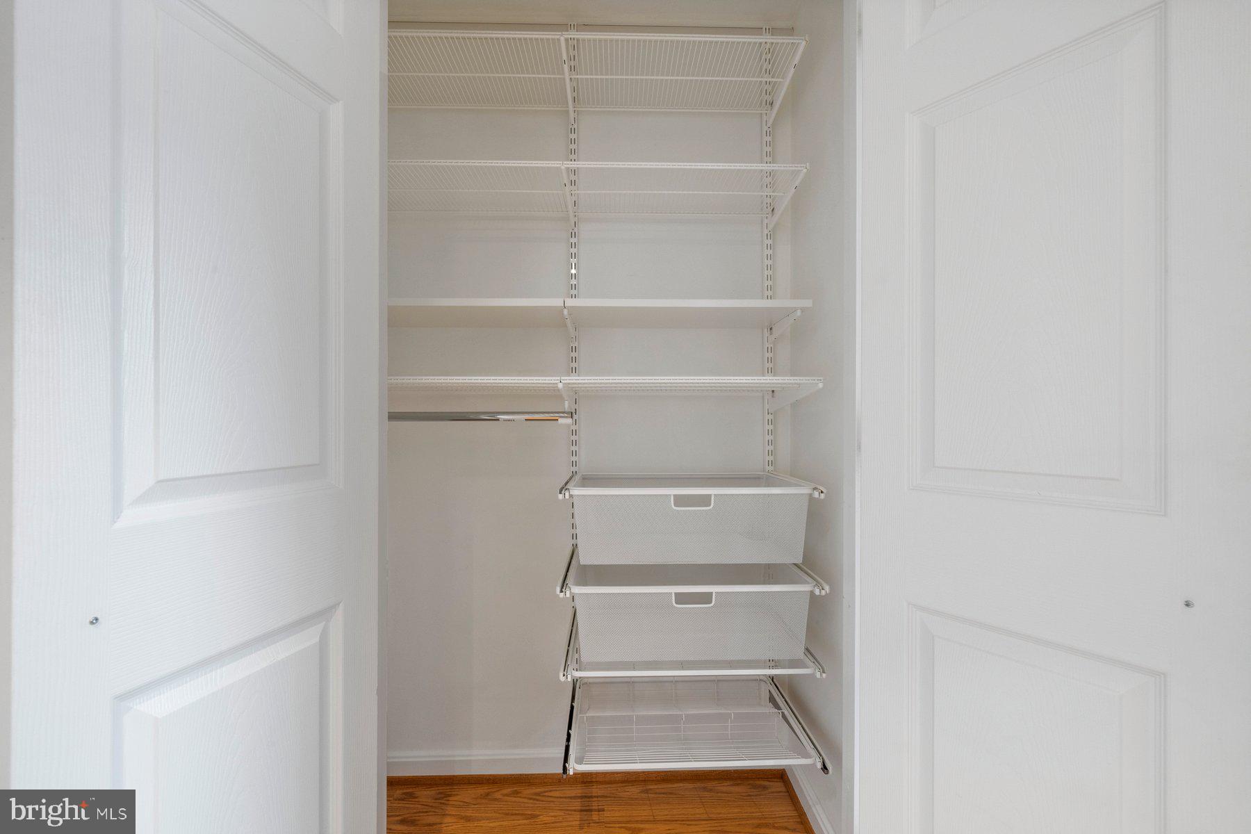 304 Southwest Drive Silver Spring, MD 20901 - Photo 30 of 37 a view of walk in closet with empty racks
