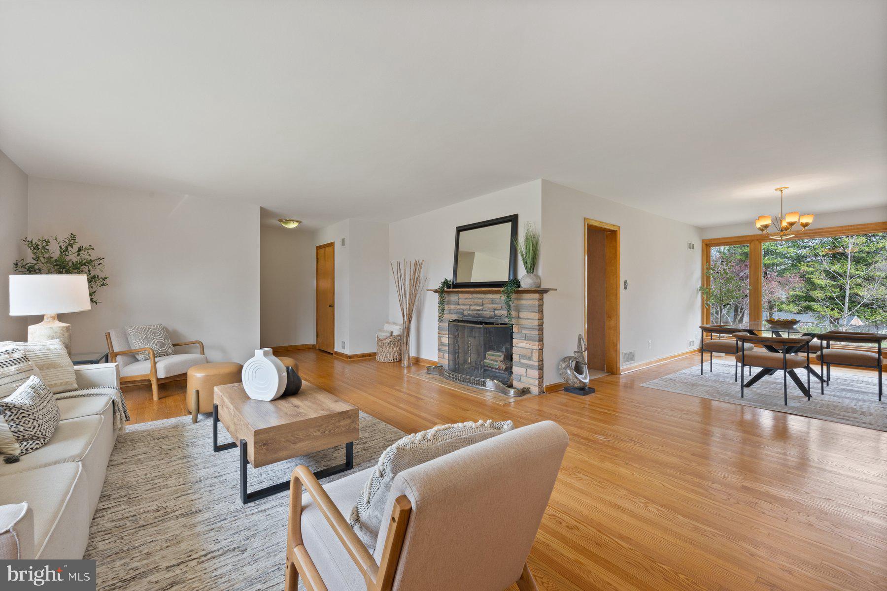 304 Southwest Drive Silver Spring, MD 20901 - Photo 6 of 37 a living room with furniture and a fireplace