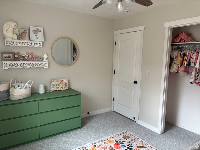 1324 West Raintree Drive, Unit 44 Price, UT 84501 - Photo 20 of 25 Light-toned wall paint and grey patterned carpeting establish a neutral base