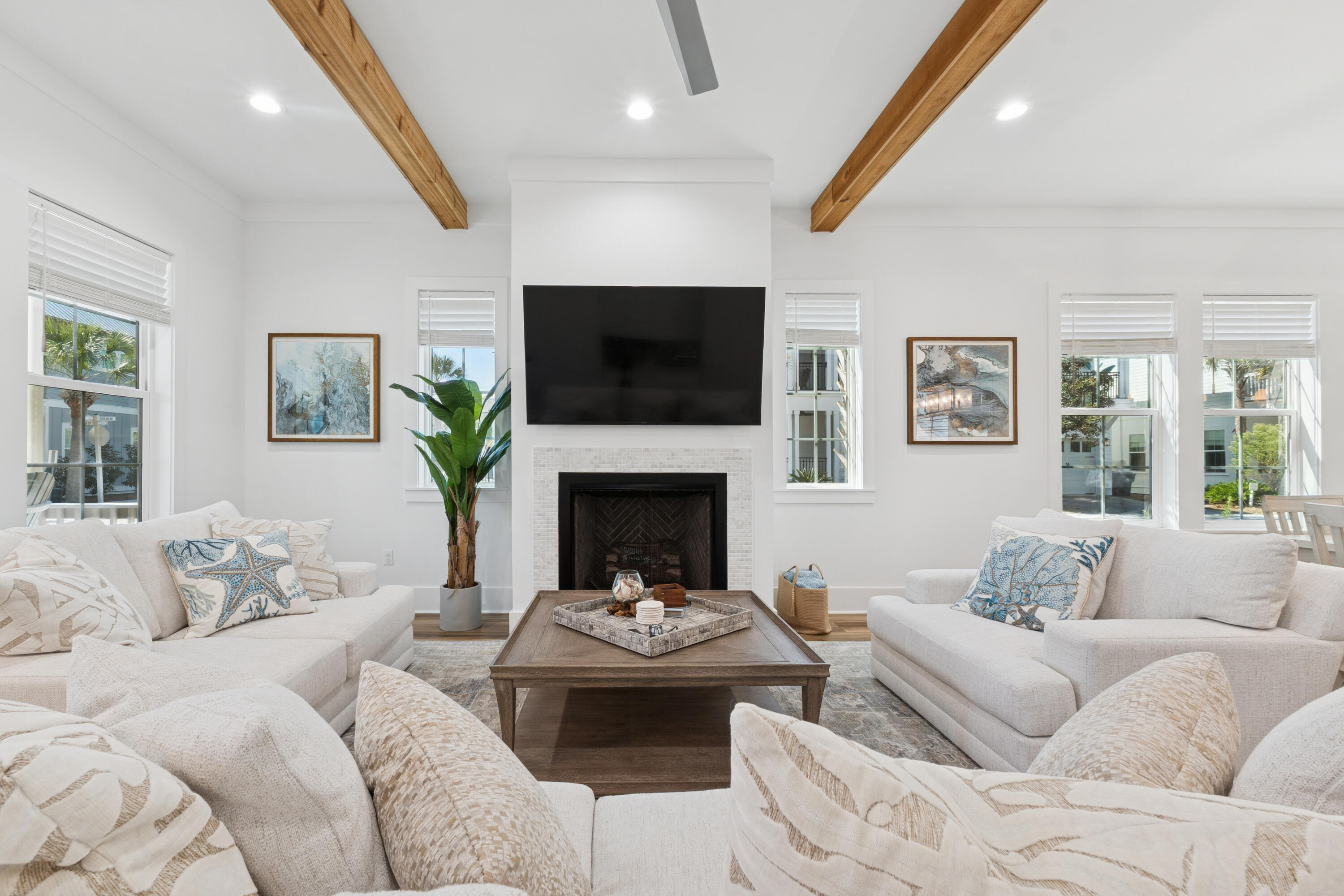 342 Beach Bike Way Inlet Beach Inlet Beach, FL 32461 - Photo 12 of 77 a living room with furniture a flat screen tv and a fireplace