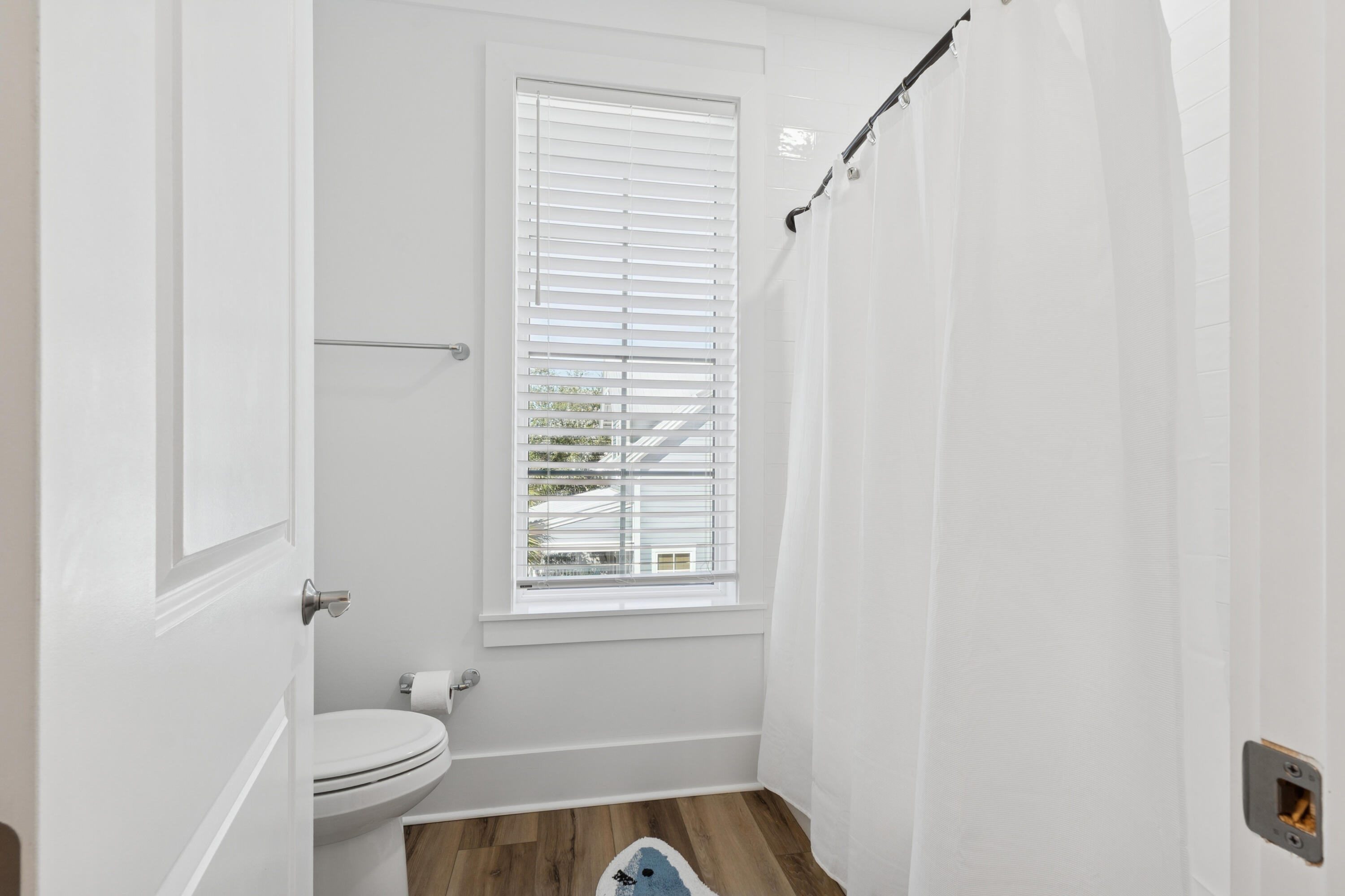 342 Beach Bike Way Inlet Beach Inlet Beach, FL 32461 - Photo 51 of 77 a bathroom with a toilet and a shower curtain