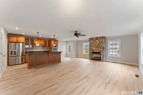 a view of a kitchen with a sink and a microwave
