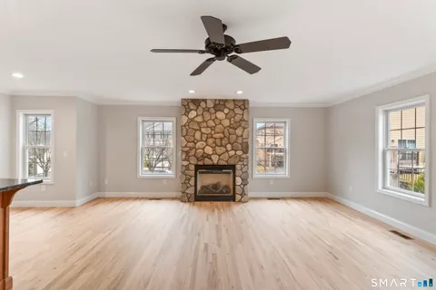 a kitchen with stainless steel appliances granite countertop a stove and a microwave