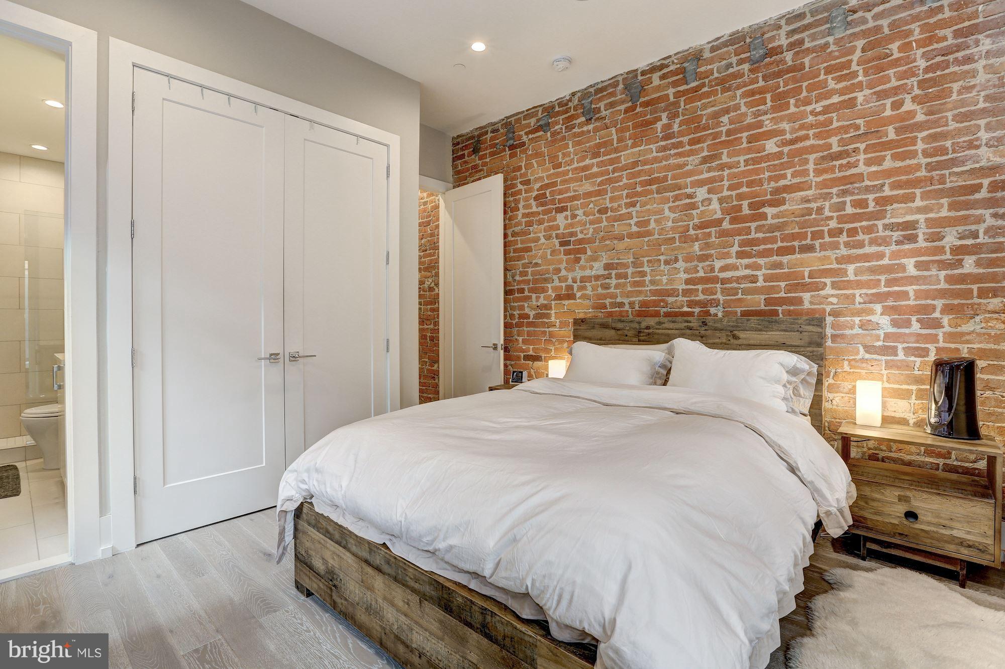 1817 Vernon Street Northwest, Unit 2 Washington, DC 20009 - Photo 16 of 24 Exposed brick wall (Master Bedroom)