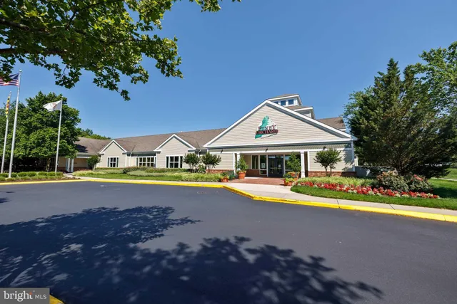 a front view of a house with swimming pool