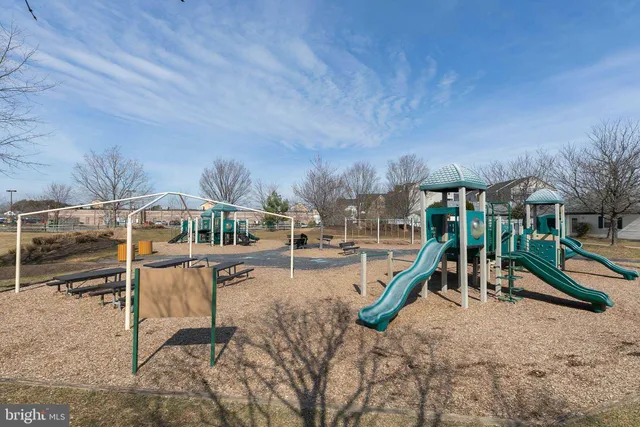 a view of a slide with a bench