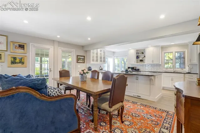 a living room with furniture and a table