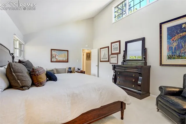a view of a hallway with furniture and entryway