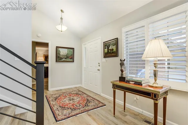 a view of a workspace with furniture