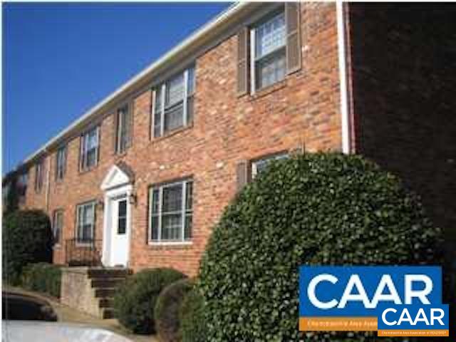 2422 Barracks Place, Unit 3 Charlottesville, VA 22901 - Photo 5 of 6 a sign that is on the side of building
