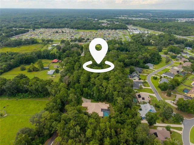 a view of a lake with a swimming pool
