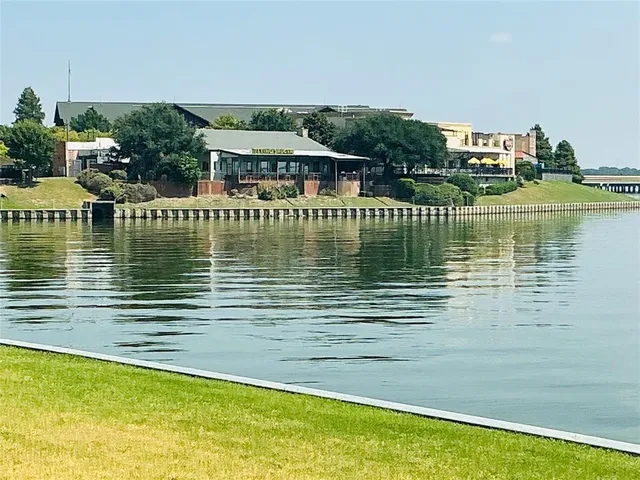 a view of a lake with a house
