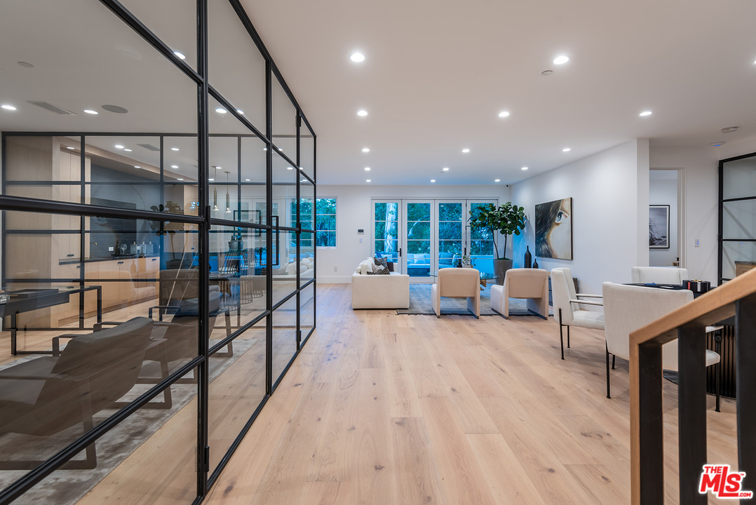 5716 Jed Smith Road Hidden Hills, CA 91302 - Photo 24 of 53 a living room with furniture and a table