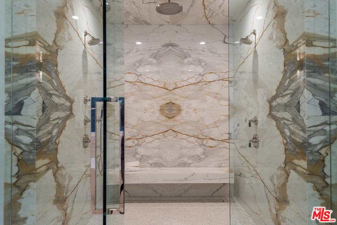 5716 Jed Smith Road Hidden Hills, CA 91302 - Photo 40 of 53 a bathroom with a shower