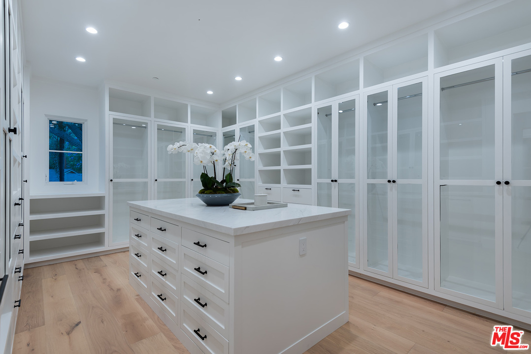 5716 Jed Smith Road Hidden Hills, CA 91302 - Photo 41 of 53 a room with a cabinets and a sink