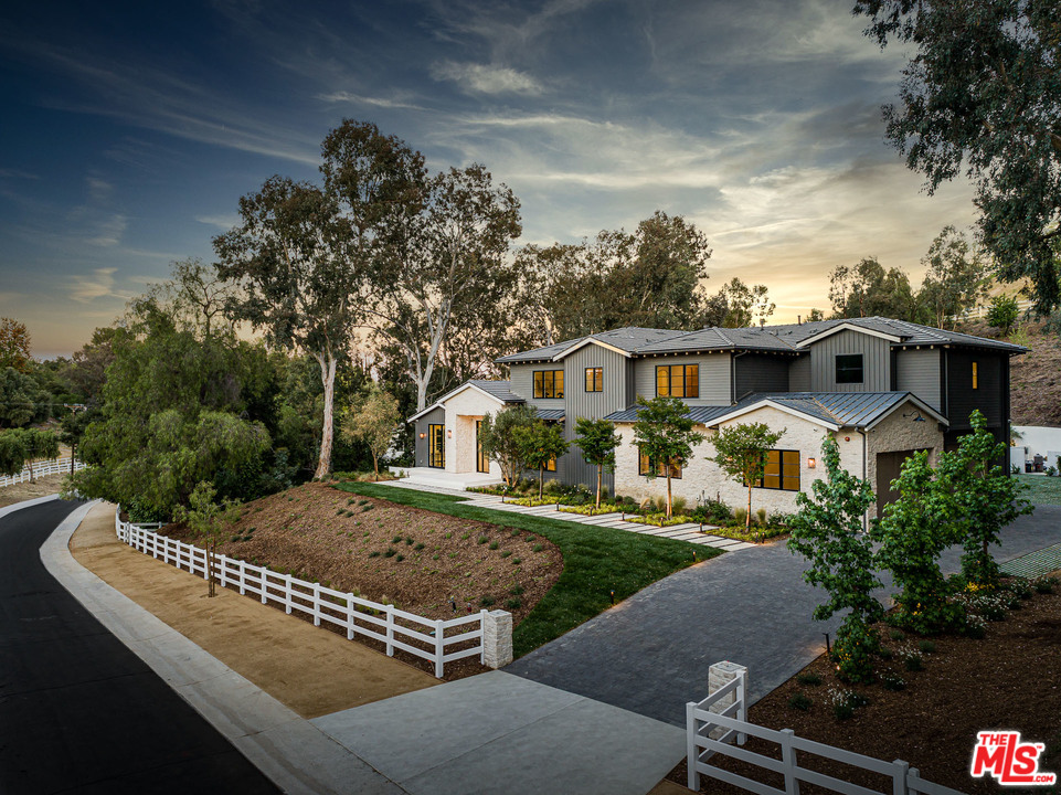 5716 Jed Smith Road Hidden Hills, CA 91302 - Photo 50 of 53 a view of house with outdoor space and sitting area