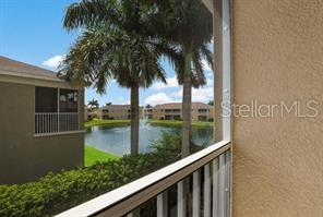 8653 Karpeal Drive, Unit 4 Sarasota, FL 34238 - Photo 13 of 14 a view of swimming pool from a balcony