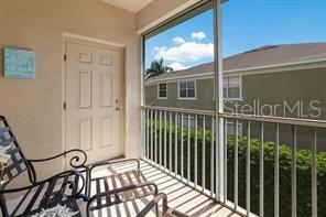 8653 Karpeal Drive, Unit 4 Sarasota, FL 34238 - Photo 14 of 14 a view of a balcony with chairs