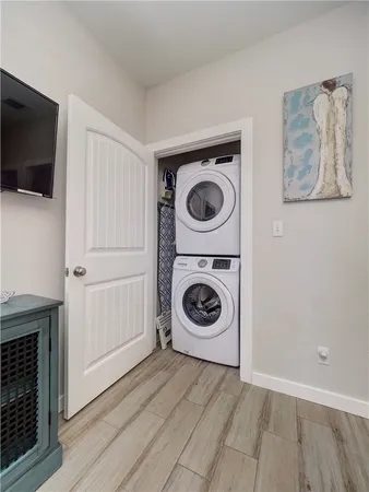 a view of a storage & utility room with wooden floor