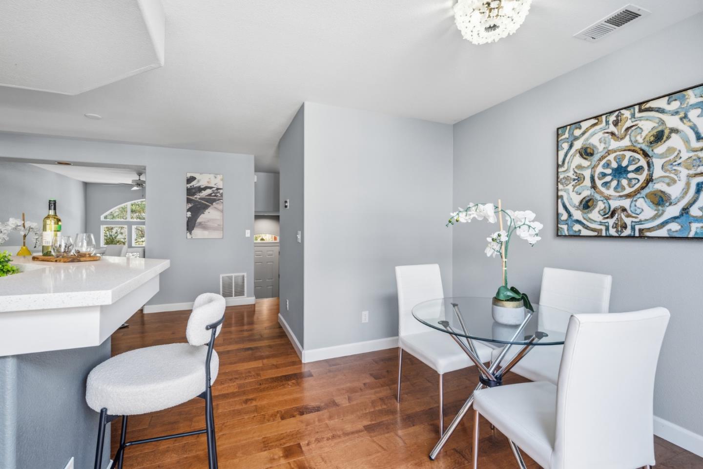 71 Patrick Way Half Moon Bay, CA 94019 - Photo 17 of 37 a view of a dining room with furniture and wooden floor