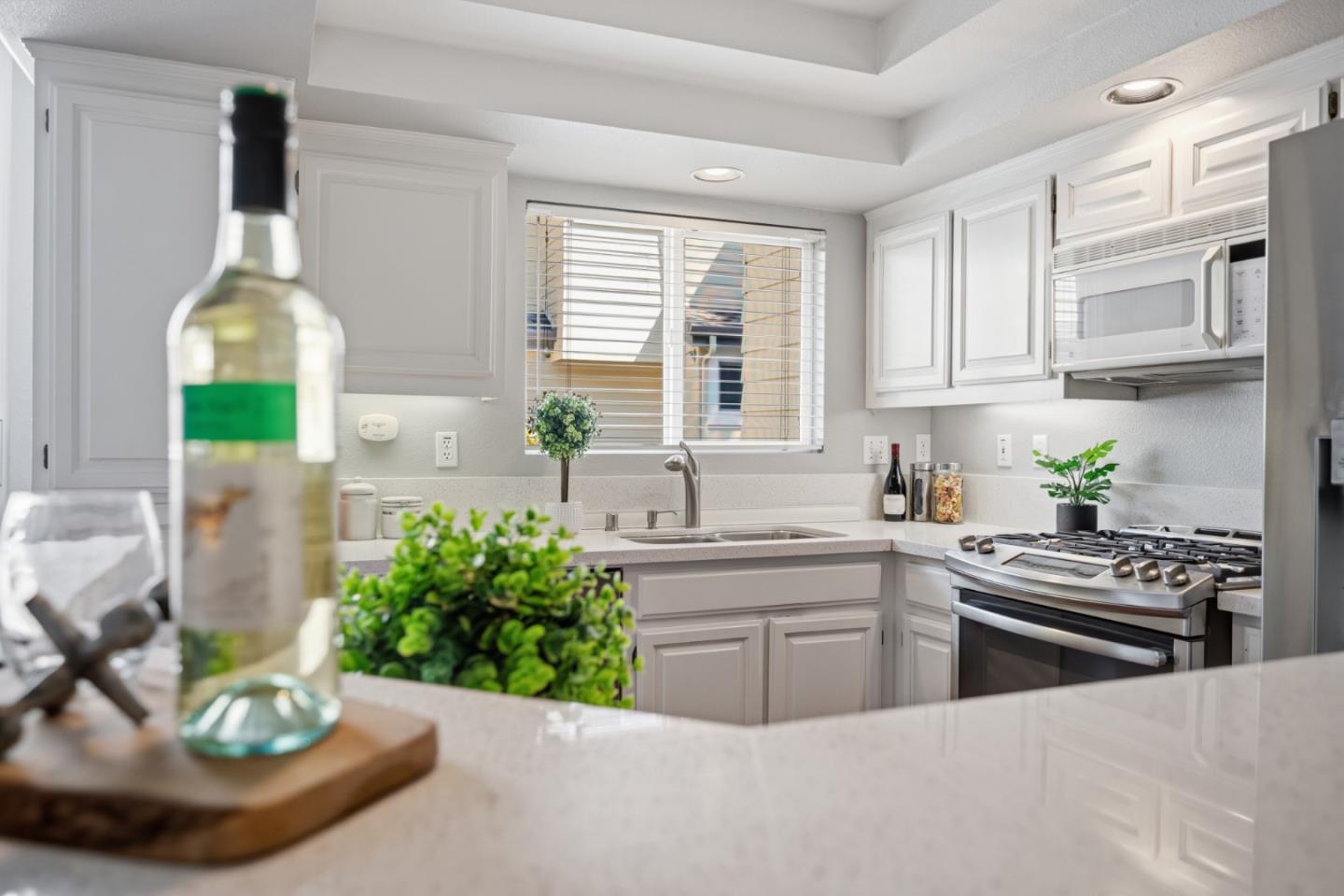 71 Patrick Way Half Moon Bay, CA 94019 - Photo 18 of 37 a kitchen with a sink cabinets and window