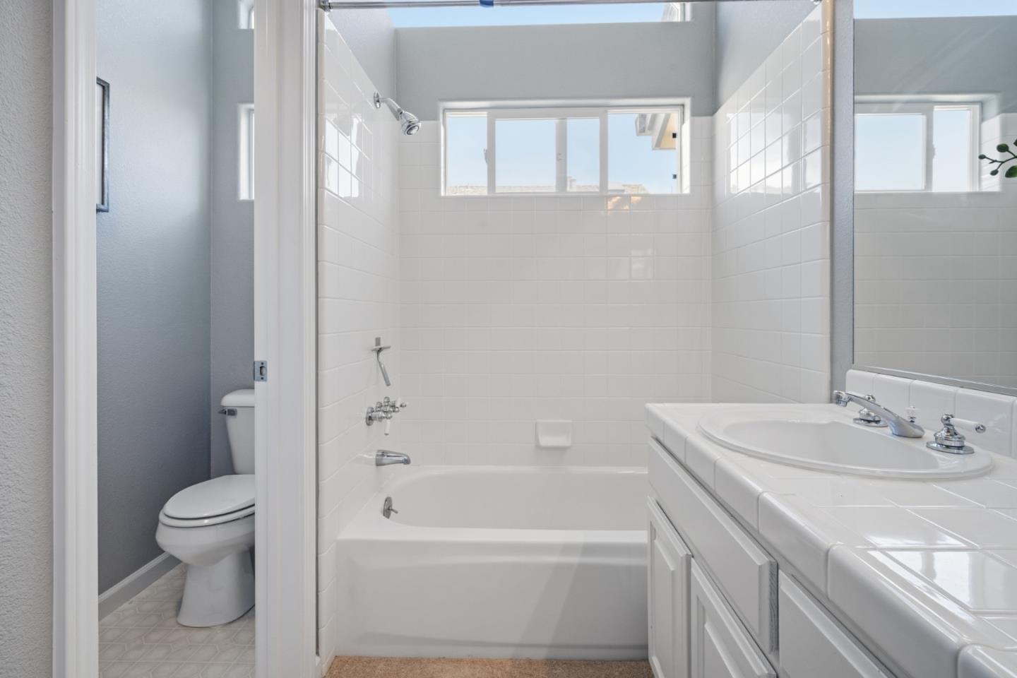 71 Patrick Way Half Moon Bay, CA 94019 - Photo 29 of 37 a bathroom with a sink toilet and shower