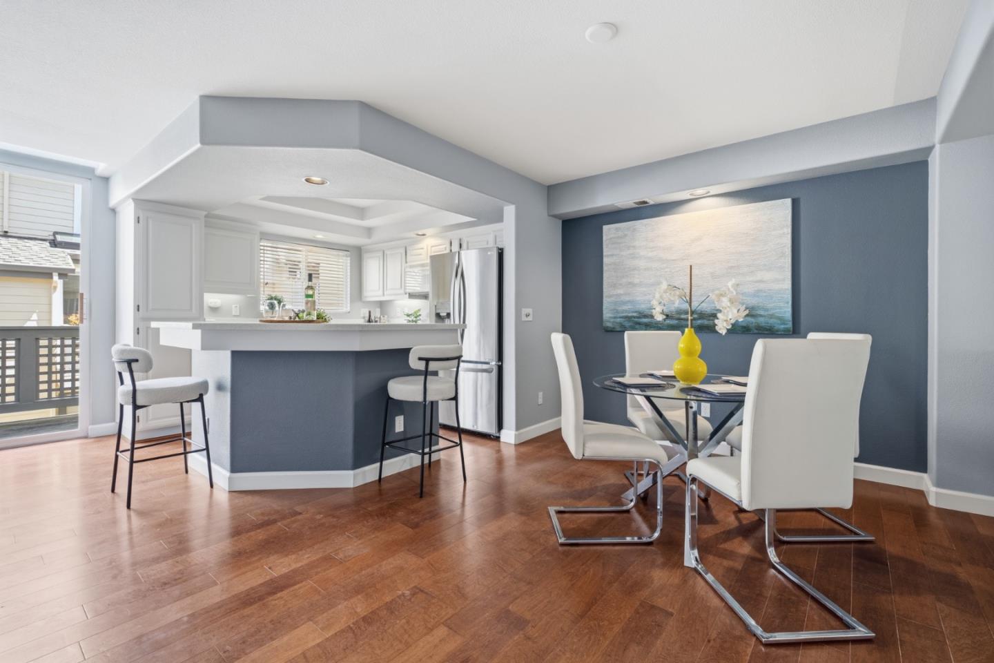 71 Patrick Way Half Moon Bay, CA 94019 - Photo 8 of 37 a view of a dining room with furniture and wooden floor