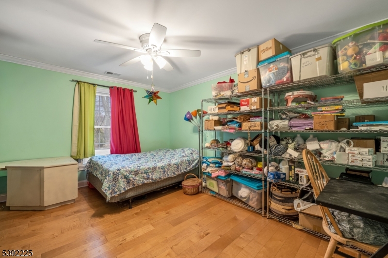255 Knoll Road Lake Hiawatha, NJ 07034 - Photo 20 of 32 a living room with furniture and a chandelier