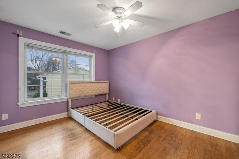 255 Knoll Road Lake Hiawatha, NJ 07034 - Photo 22 of 32 a bedroom with a bed and a window