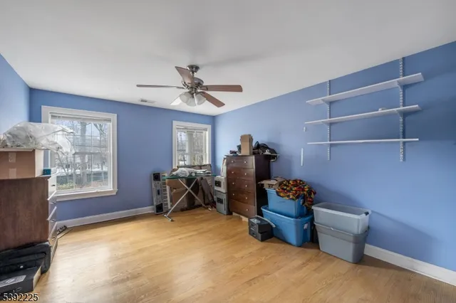 a livingroom with furniture and a window