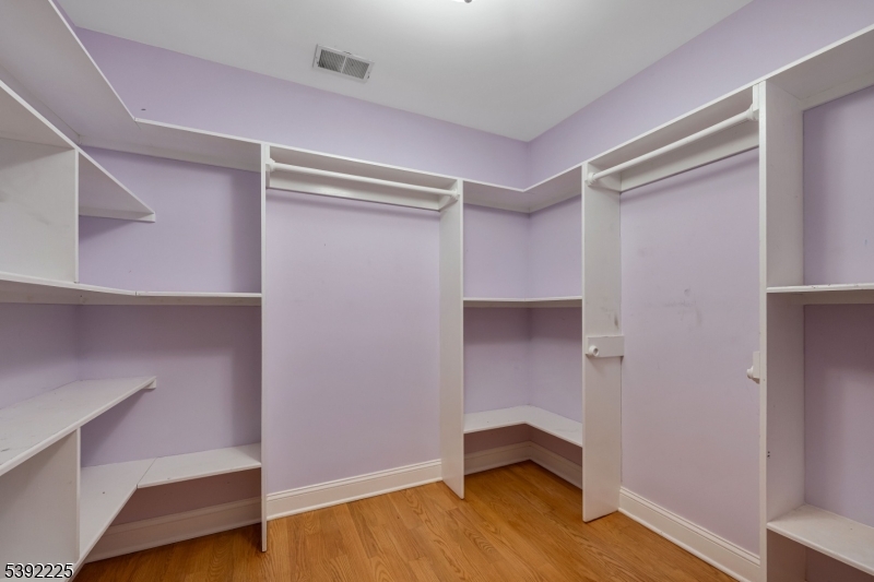 255 Knoll Road Lake Hiawatha, NJ 07034 - Photo 27 of 32 a view of an empty room with wooden floor