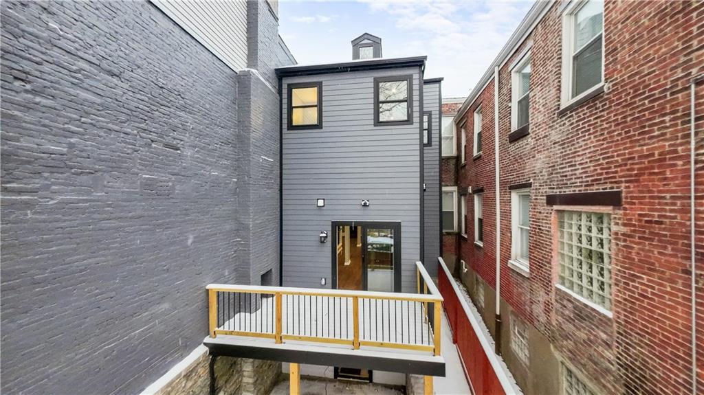 111 Hemlock Street Pittsburgh, PA 15212 - Photo 18 of 50 Spring will be here before you know it! Can't you just picture a wonderful patio set and grill out here? Hang party lights and you'll never want to leave this space! Summer nights relaxing...here we come!