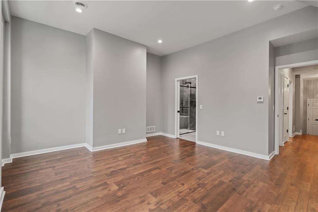 111 Hemlock Street Pittsburgh, PA 15212 - Photo 27 of 50 Just relax and say ahhhhhh. Your primary bedroom is serene. so much closet space! So much room to decorate and design! And look at those gorgeous windows! Plus, walk right into your ensuite bathroom!