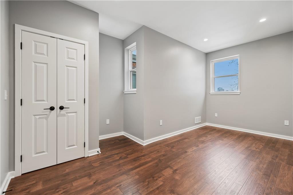 111 Hemlock Street Pittsburgh, PA 15212 - Photo 31 of 50 The second bedroom on the second floor has so much room! And again, new windows allow gorgeous light!