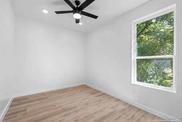 a workspace with furniture and window